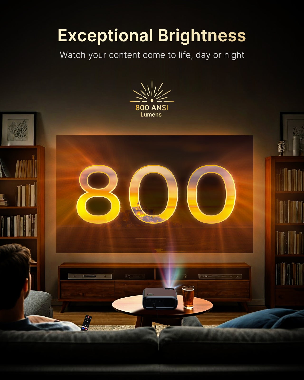 A person sits on the sofa and uses the NexiGo projector to project a movie screen with 800 brightness.